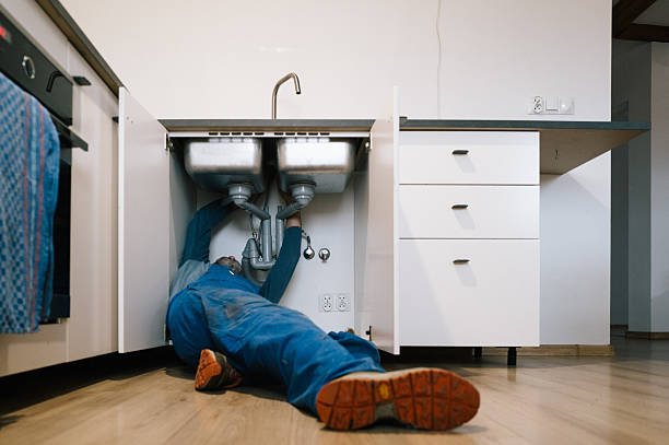 Professional Plumbing technician working in Knoxville, IL
